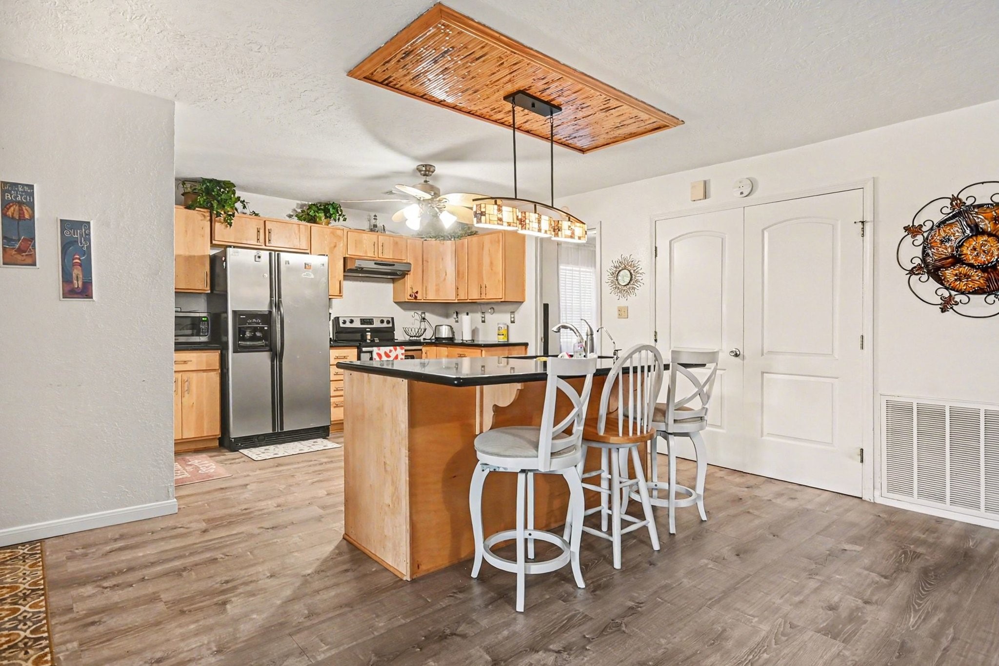 970 Wommack Drive Crystal Beach, TX 77650 - Photo 18 of 49 a dining room with furniture and window