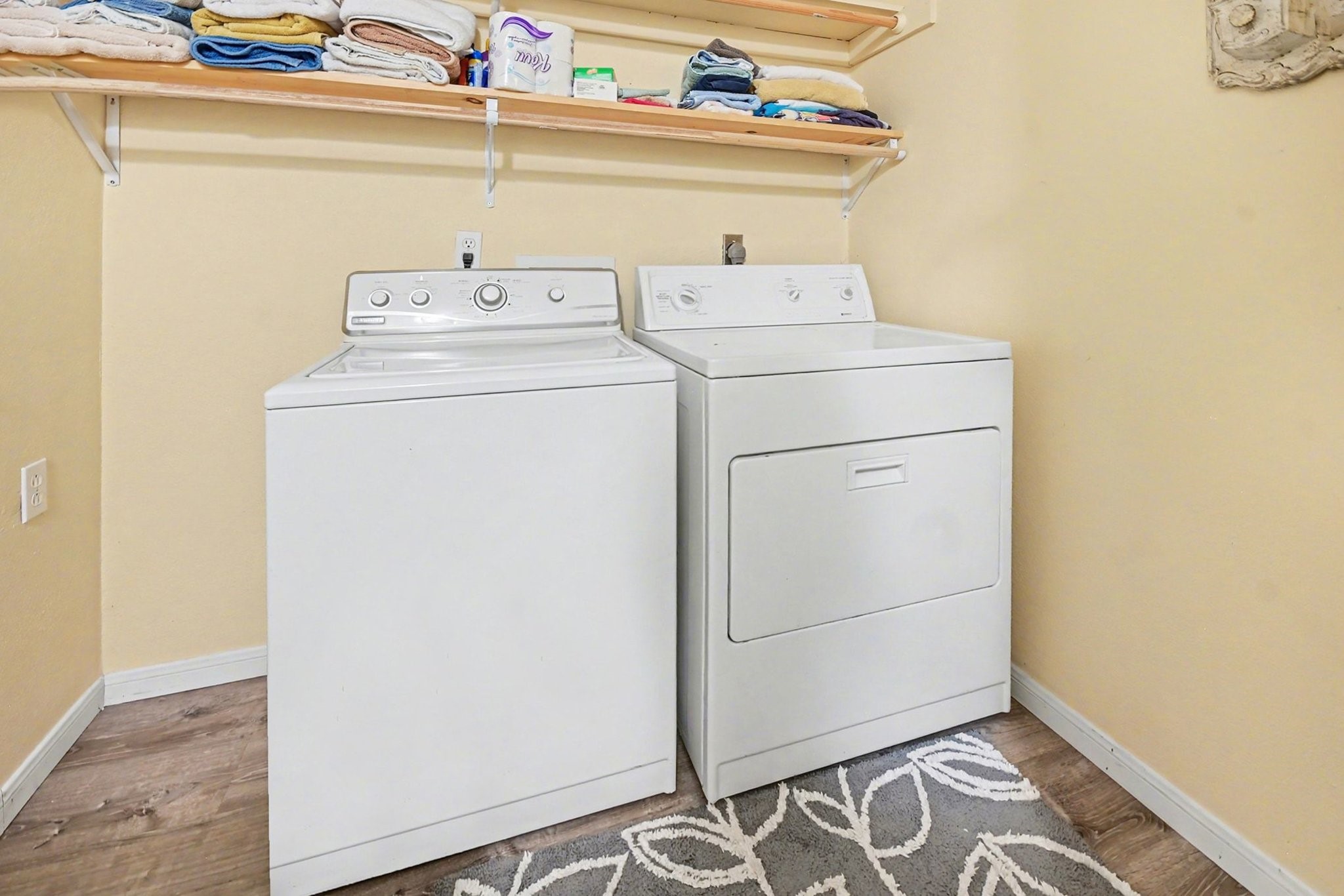 970 Wommack Drive Crystal Beach, TX 77650 - Photo 24 of 49 LAUNDRY ROOM IN THE EN-SUITE, PRIMARY BATHROOM.
