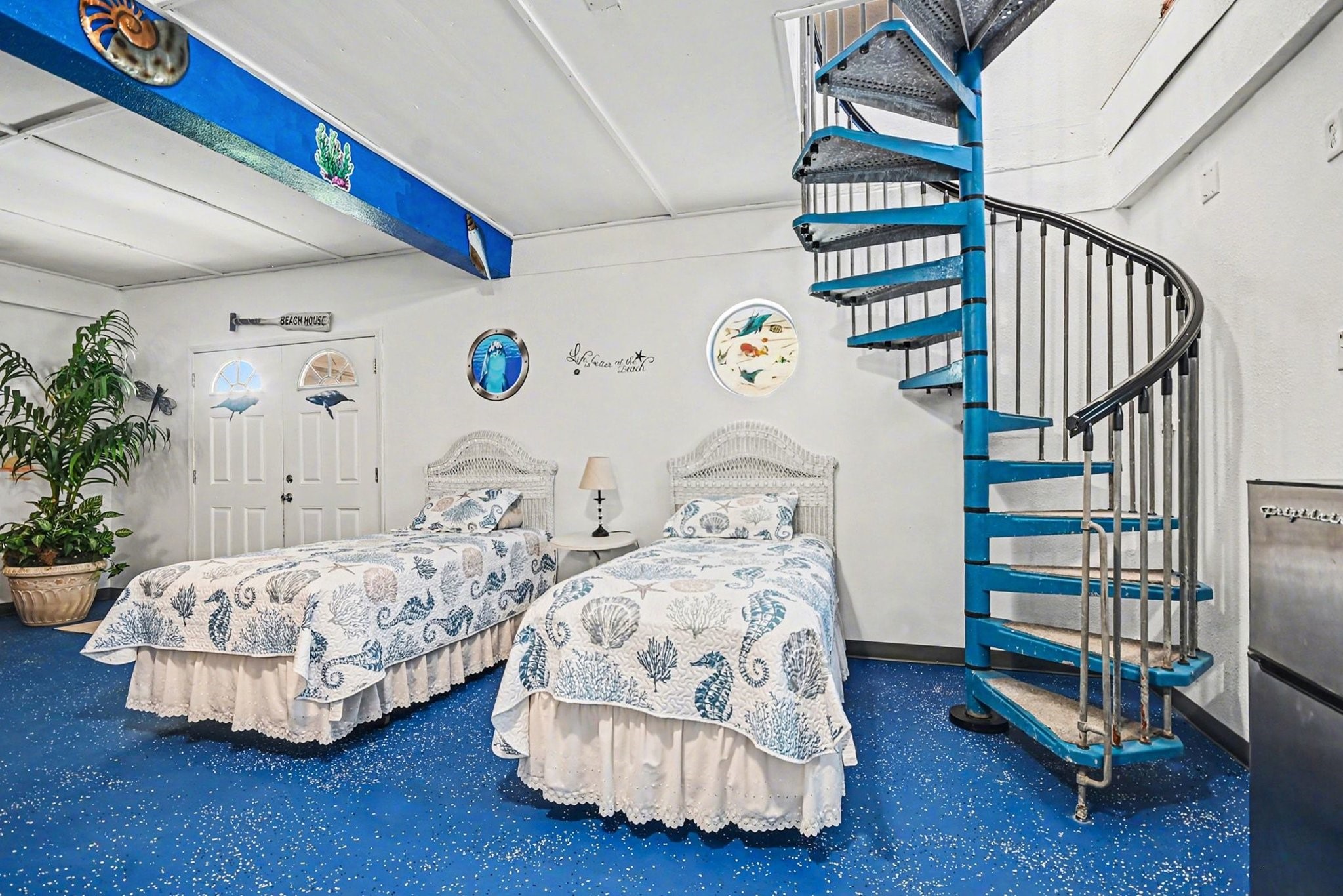 970 Wommack Drive Crystal Beach, TX 77650 - Photo 31 of 49 a bedroom with bed and a window