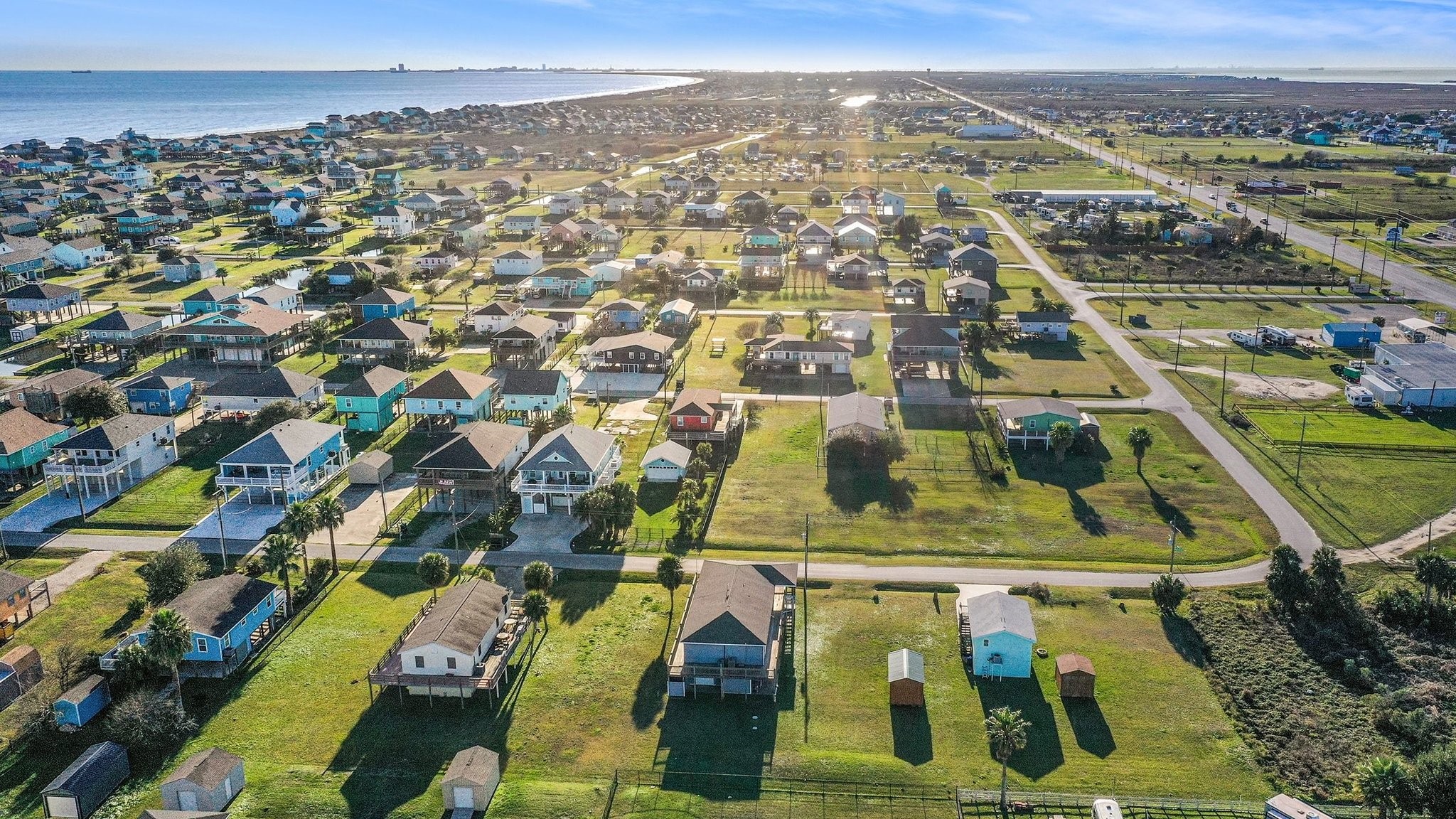 970 Wommack Drive Crystal Beach, TX 77650 - Photo 45 of 49 an aerial view of residential houses with outdoor space