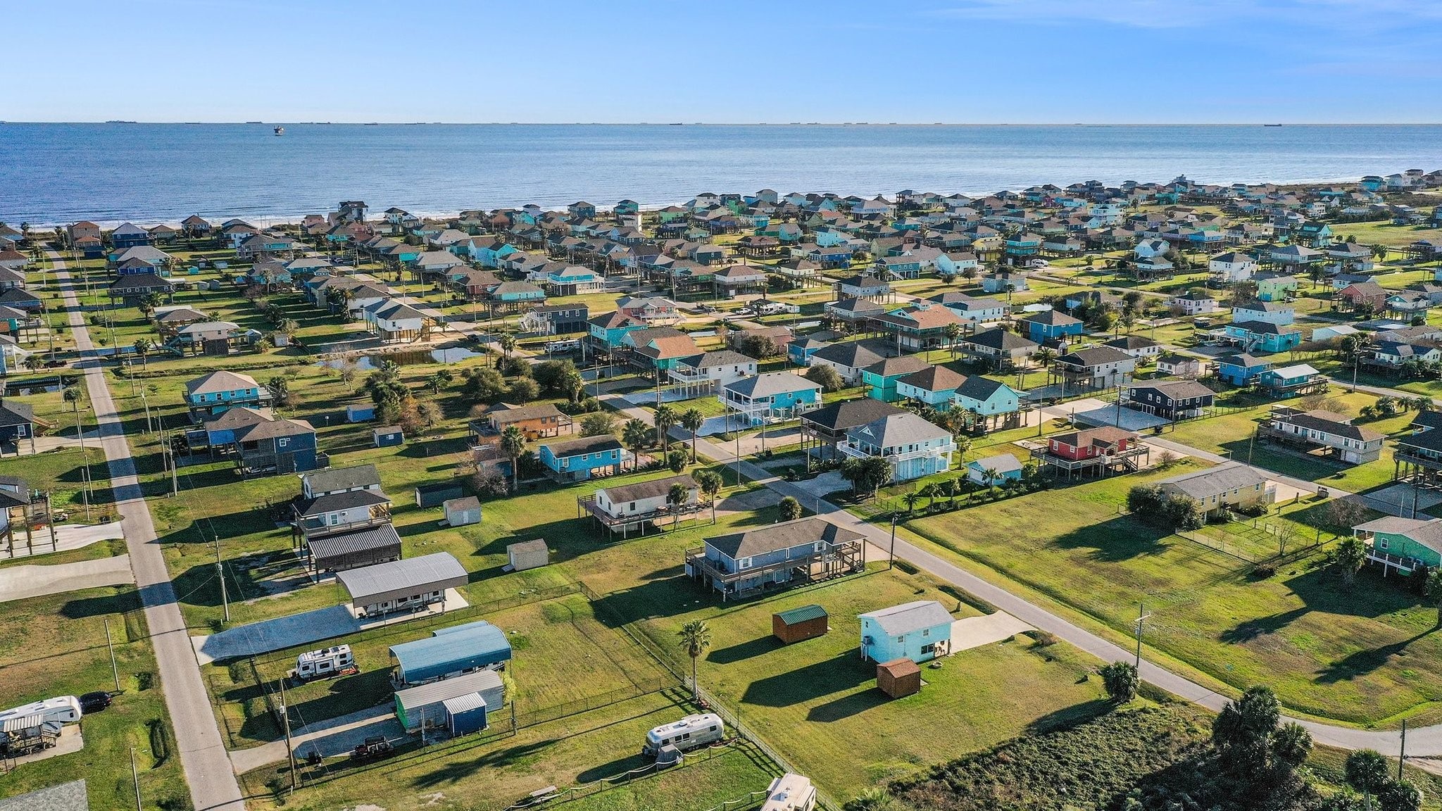 970 Wommack Drive Crystal Beach, TX 77650 - Photo 46 of 49 an aerial view of residential houses with outdoor space