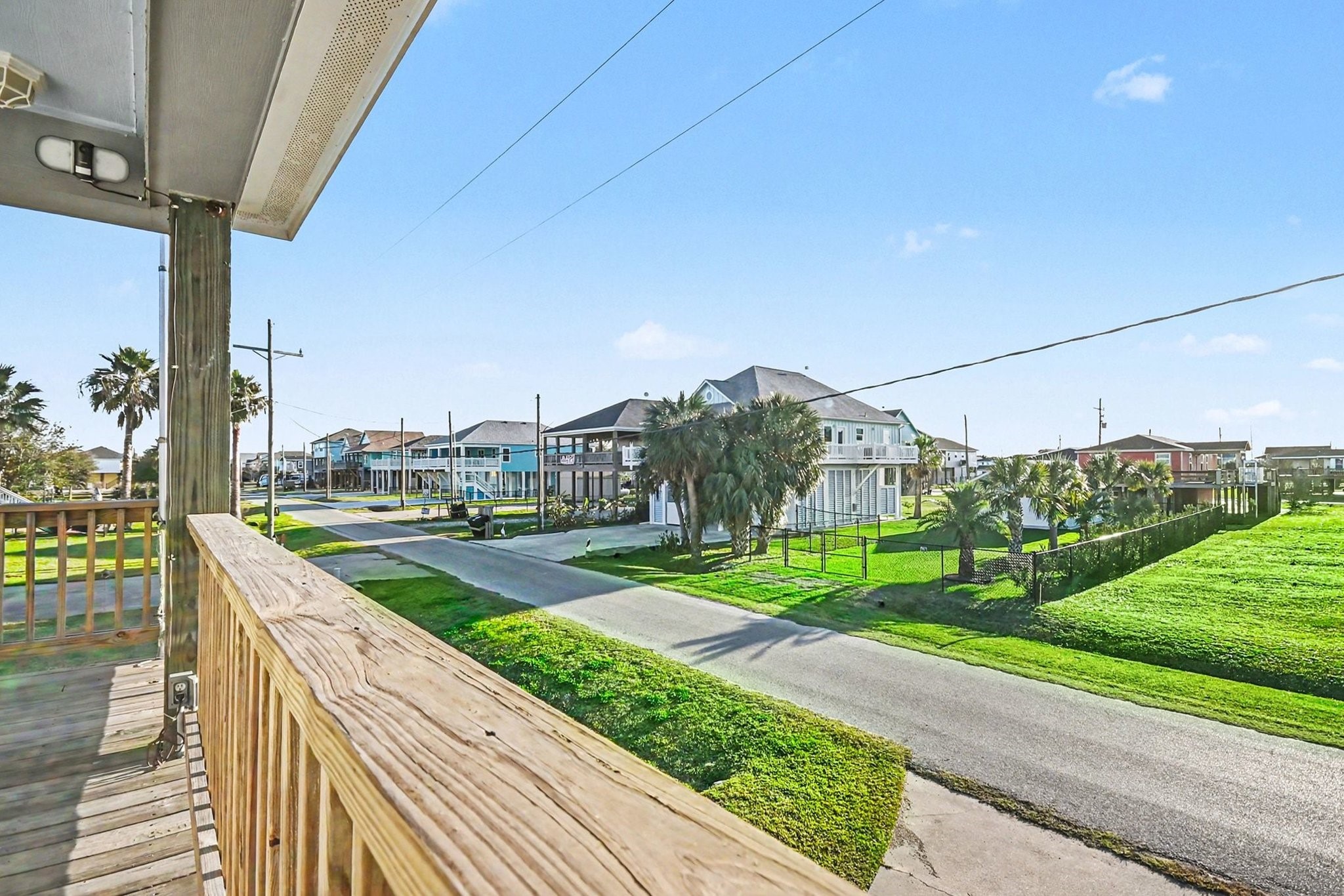 970 Wommack Drive Crystal Beach, TX 77650 - Photo 5 of 49 VIEW FROM THE FRONT PORCH TOWARD THE GULF OF AMERICA.
