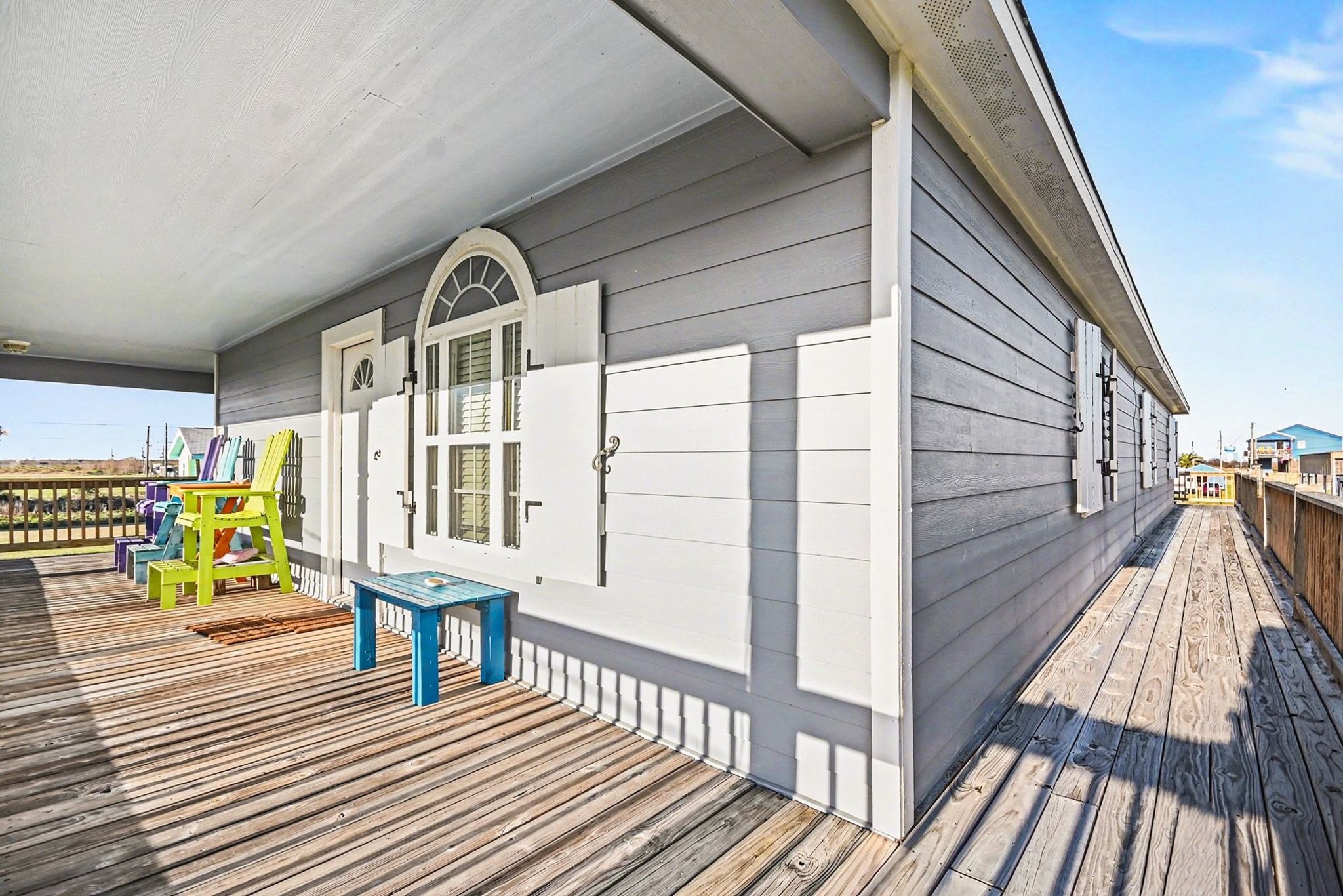 970 Wommack Drive Crystal Beach, TX 77650 - Photo 9 of 49 a view of a balcony with wooden floor