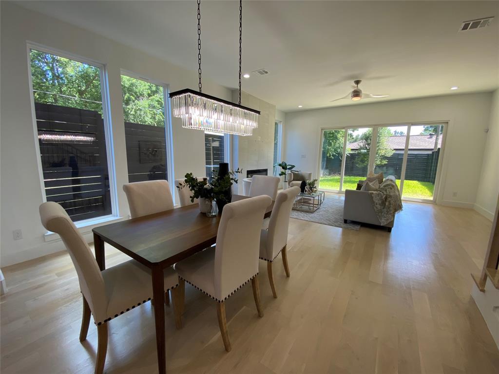 807 South Glasgow Drive Dallas, TX 75223 - Photo 8 of 25 a view of a dining room with furniture window and outside view