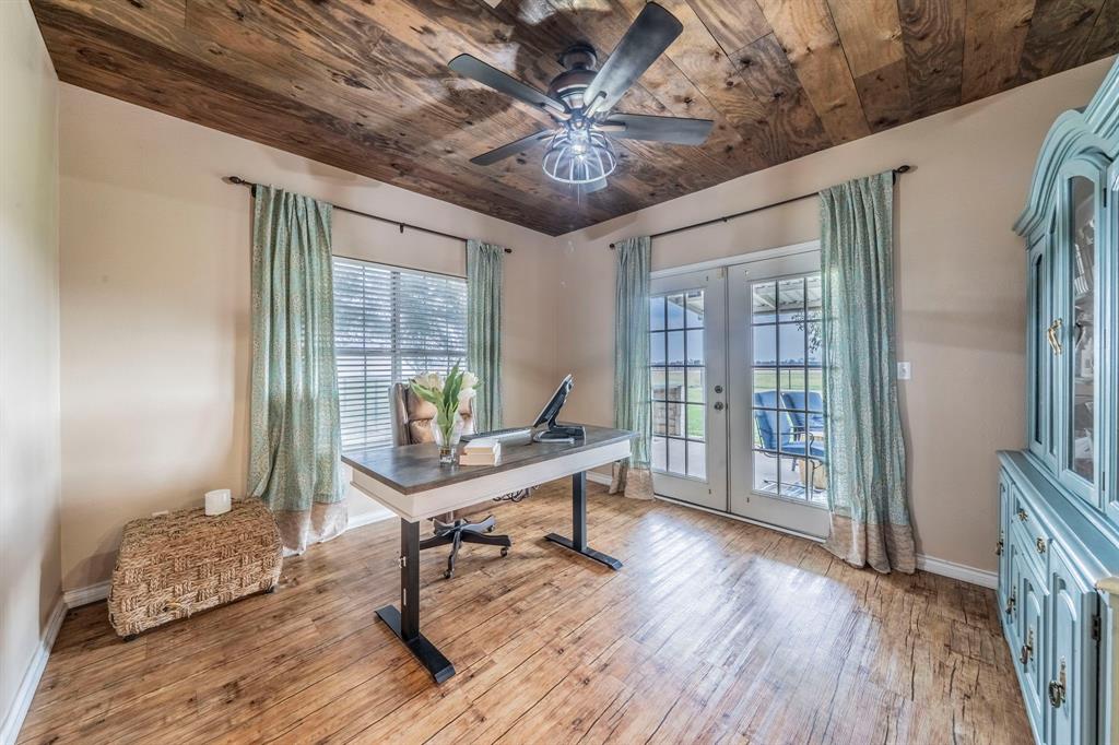 1992 Bledsoe Road Gunter, TX 75058 - Photo 12 of 40 a workspace with furniture window and wooden floor