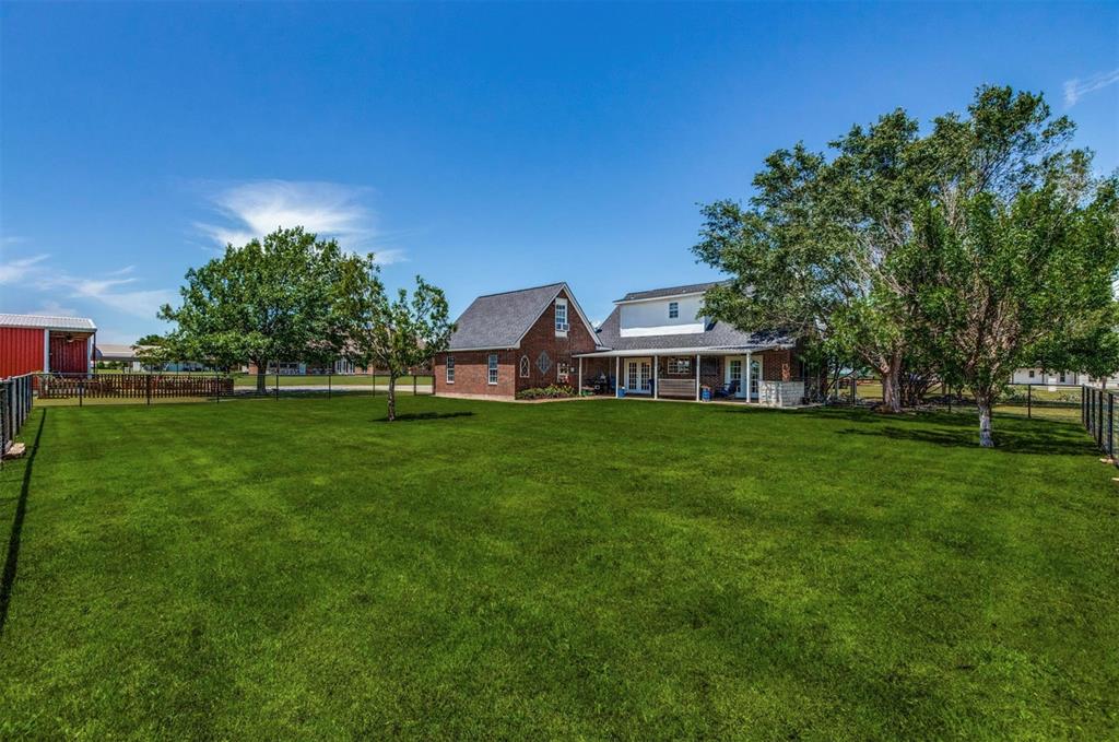 1992 Bledsoe Road Gunter, TX 75058 - Photo 24 of 40 a view of a house with a big yard