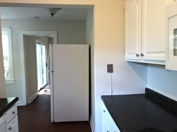 a view of an empty room and window