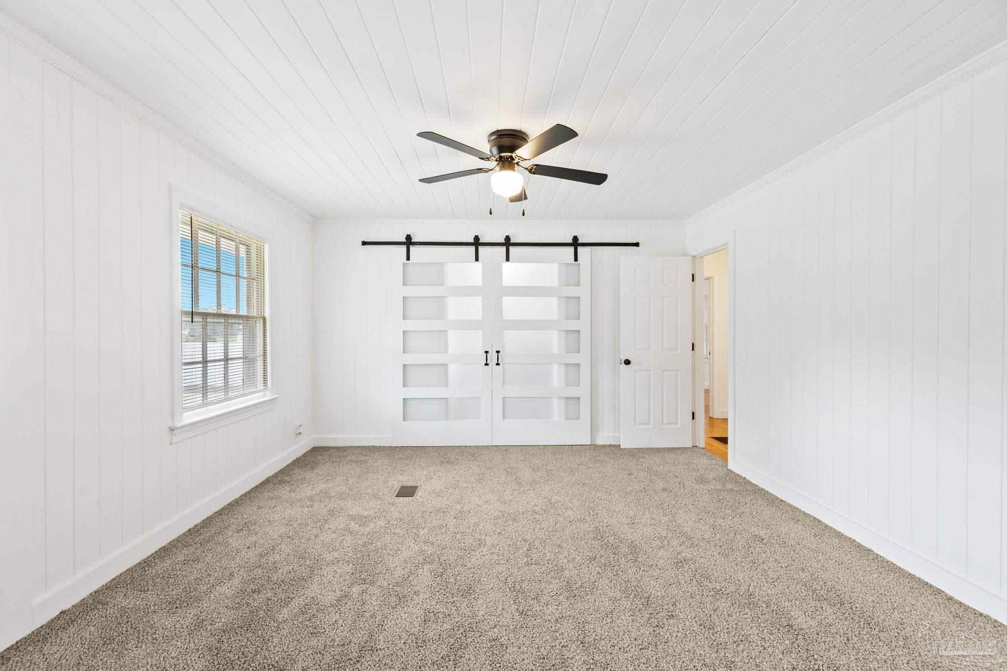 301 East Craig Street Atmore, AL 36502 - Photo 19 of 64 a view of an empty room with a window