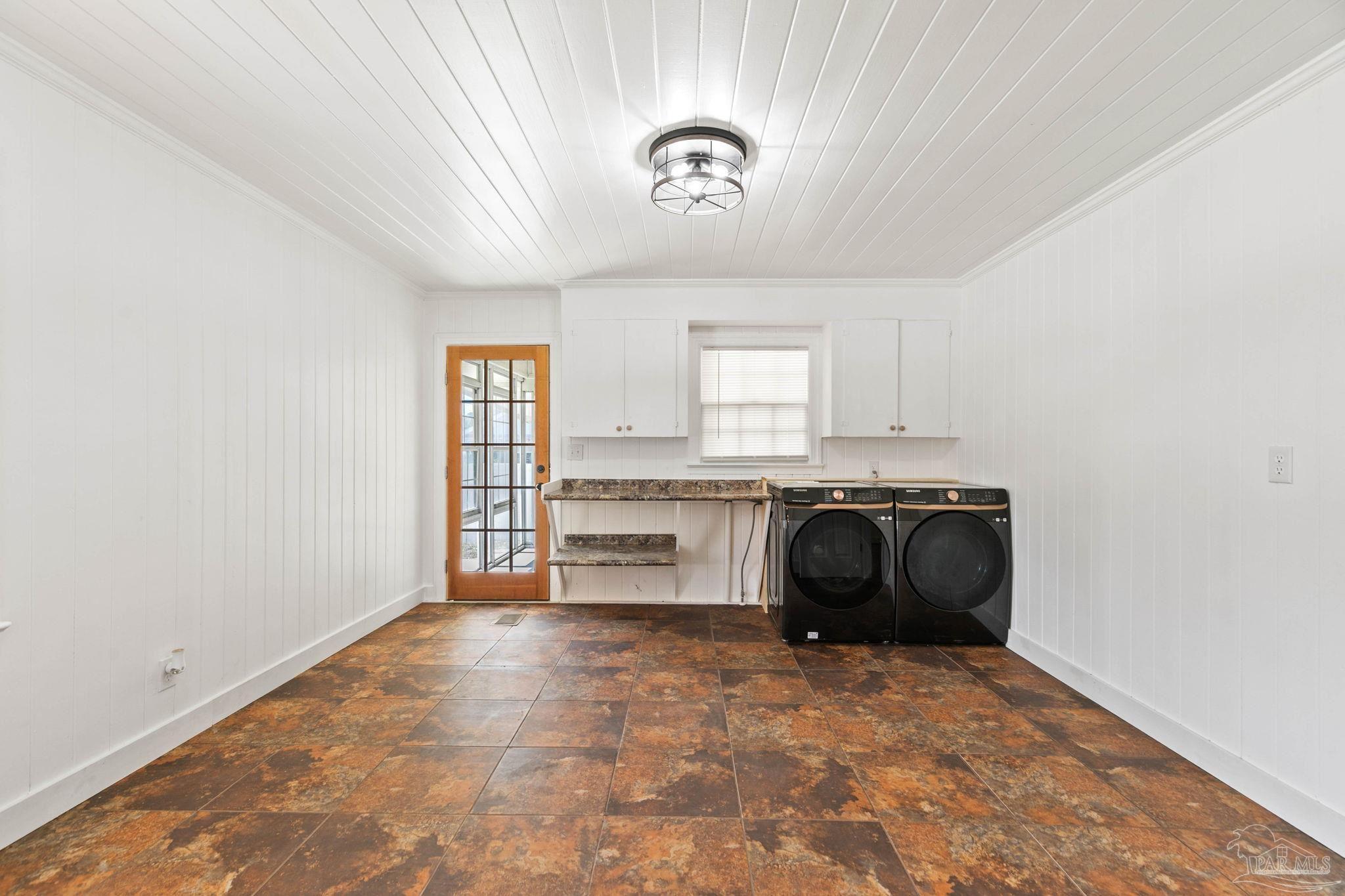 301 East Craig Street Atmore, AL 36502 - Photo 20 of 64 a view of a kitchen with granite countertop cabinets and a sink