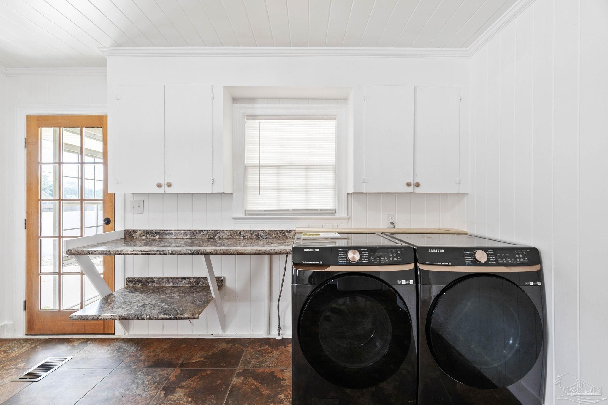 301 East Craig Street Atmore, AL 36502 - Photo 21 of 64 a utility room with sink dryer and washer