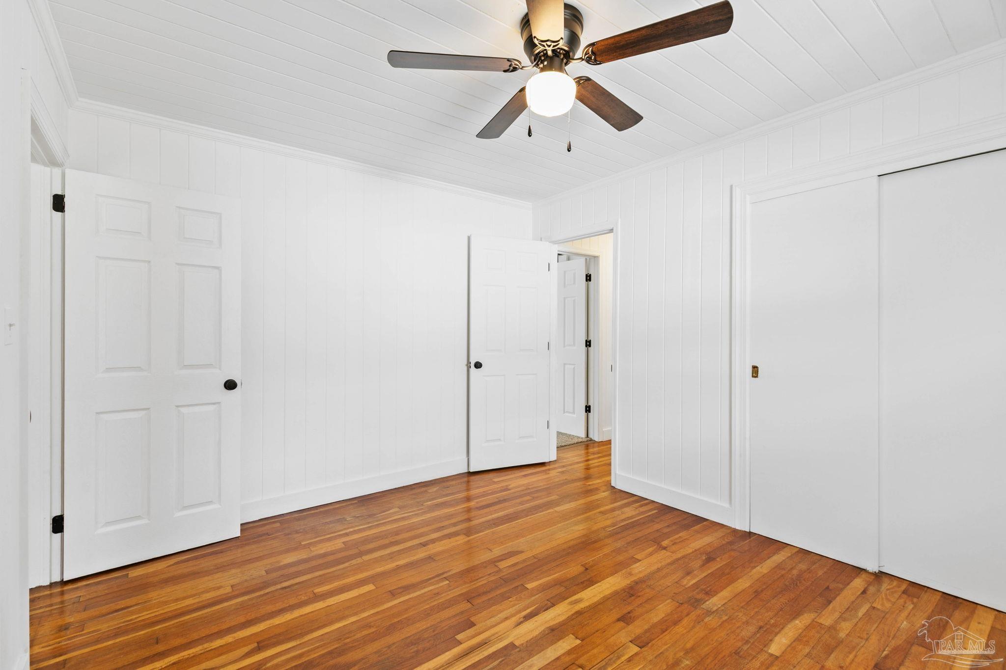 301 East Craig Street Atmore, AL 36502 - Photo 30 of 64 a view of empty room with wooden floor