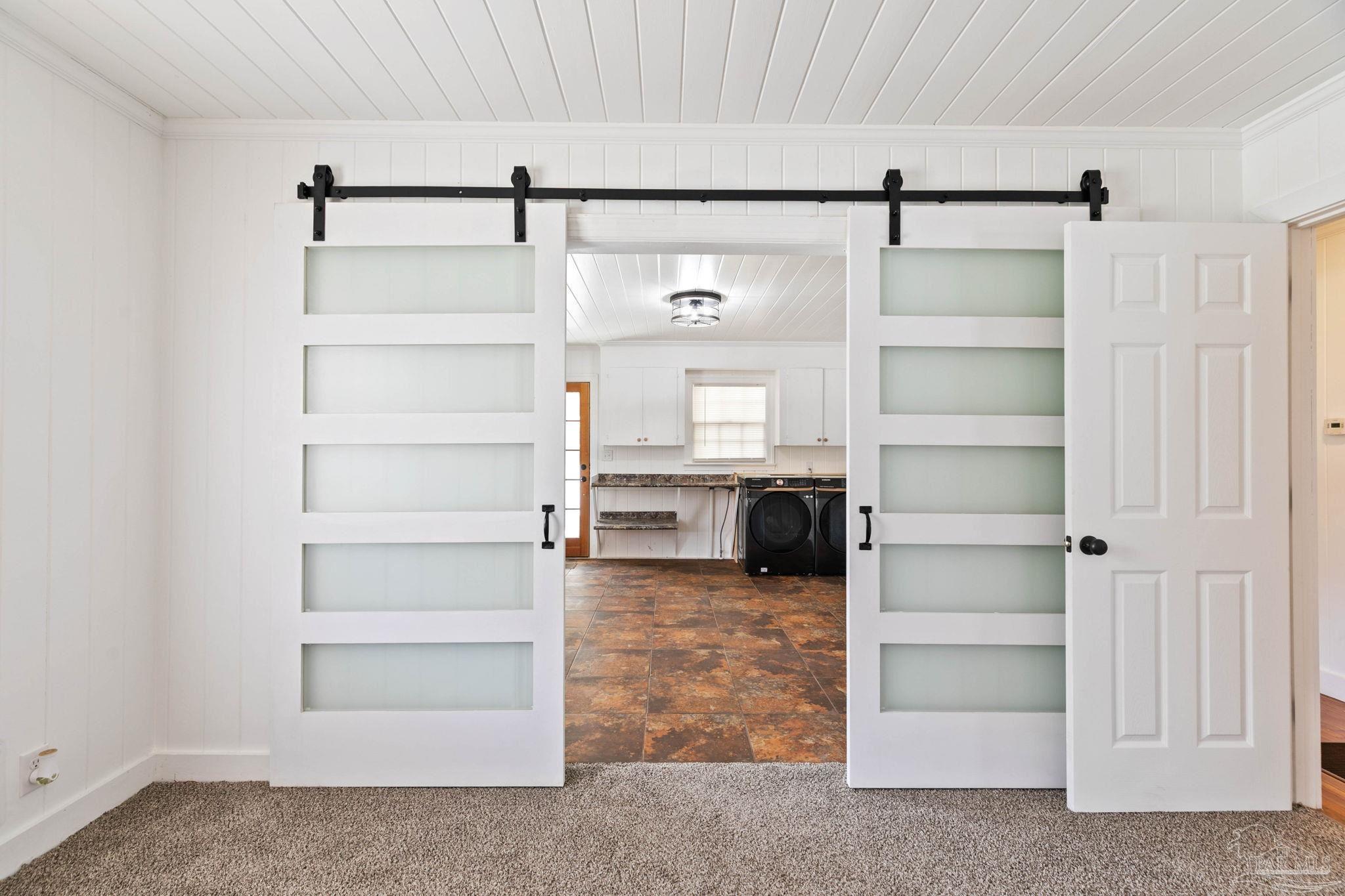 301 East Craig Street Atmore, AL 36502 - Photo 5 of 64 a view of walk in closet with empty racks