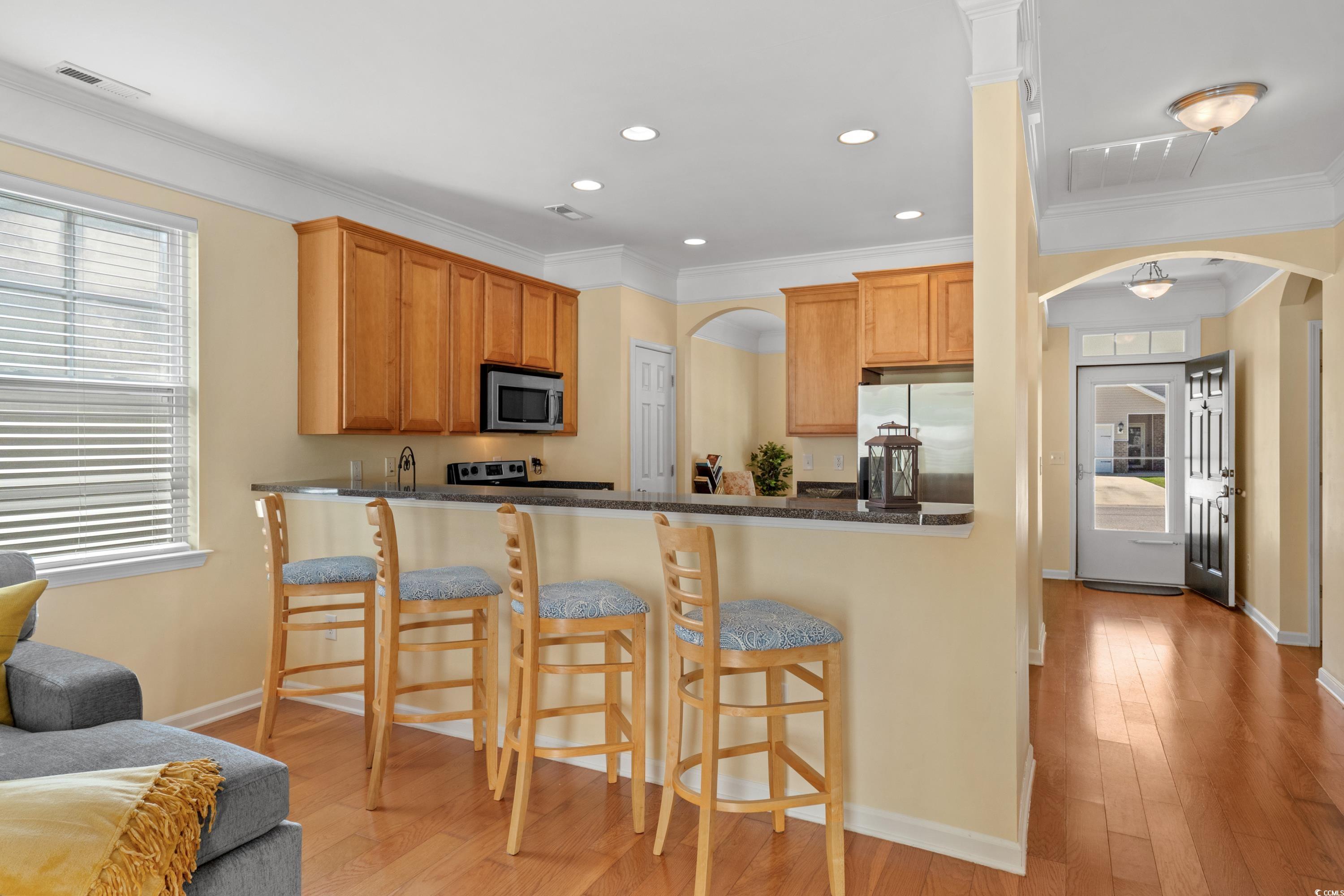 908 Oglethorpe Drive Conway, SC 29527 - Photo 12 of 40 Kitchen featuring visible vents, freestanding refr