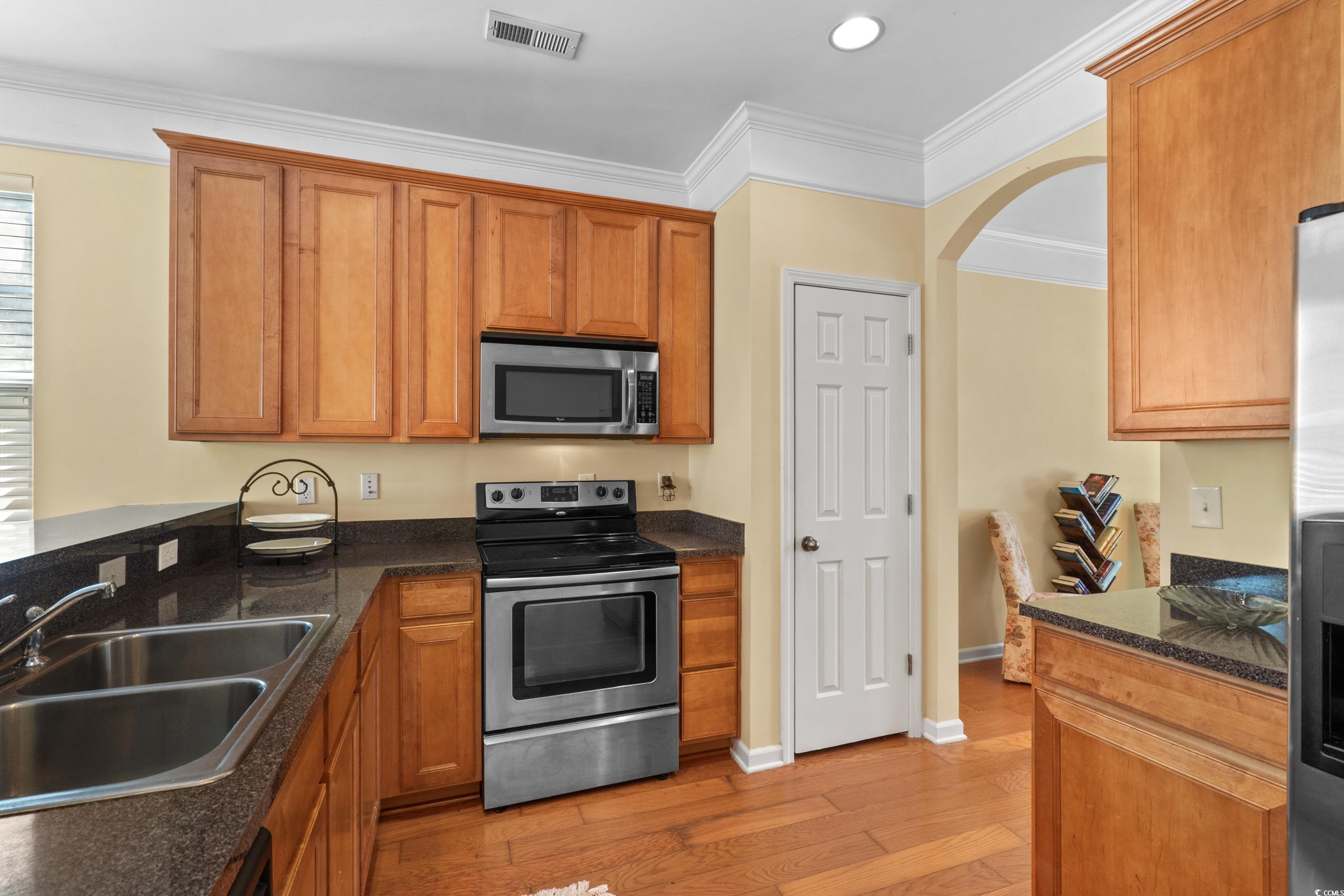 908 Oglethorpe Drive Conway, SC 29527 - Photo 15 of 40 Kitchen with visible vents, light wood-style floor