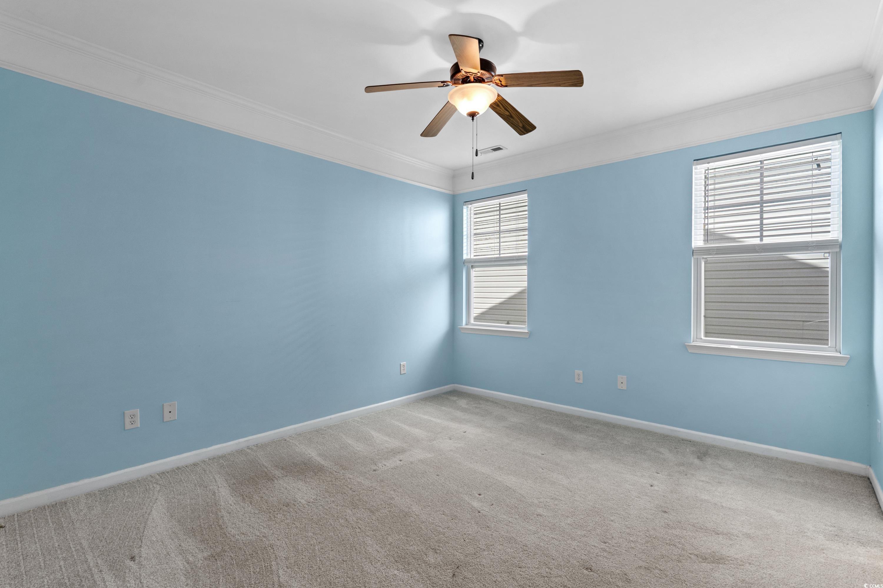 908 Oglethorpe Drive Conway, SC 29527 - Photo 17 of 40 Carpeted empty room featuring crown molding, baseb