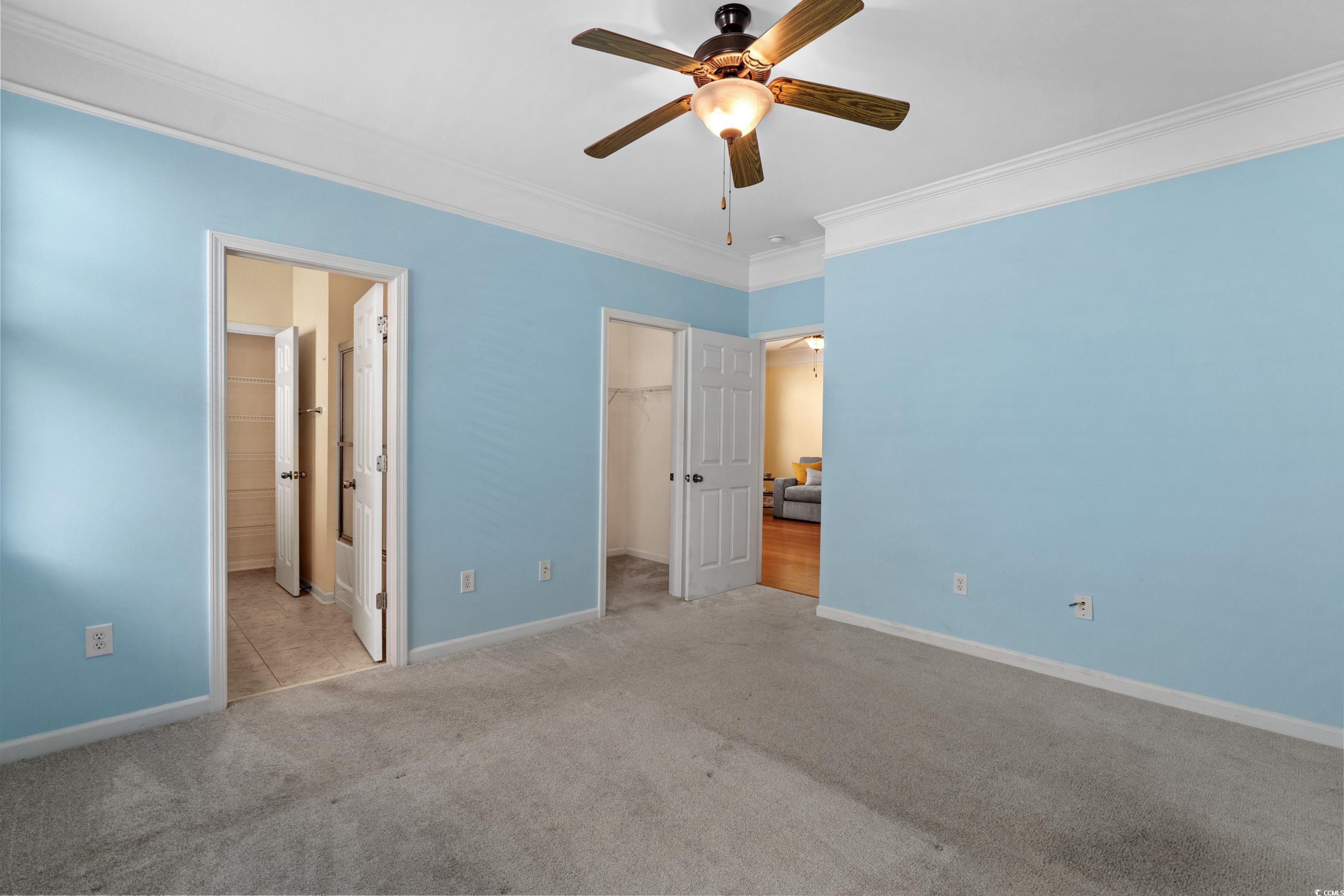 908 Oglethorpe Drive Conway, SC 29527 - Photo 19 of 40 Unfurnished bedroom with carpet flooring, a walk i