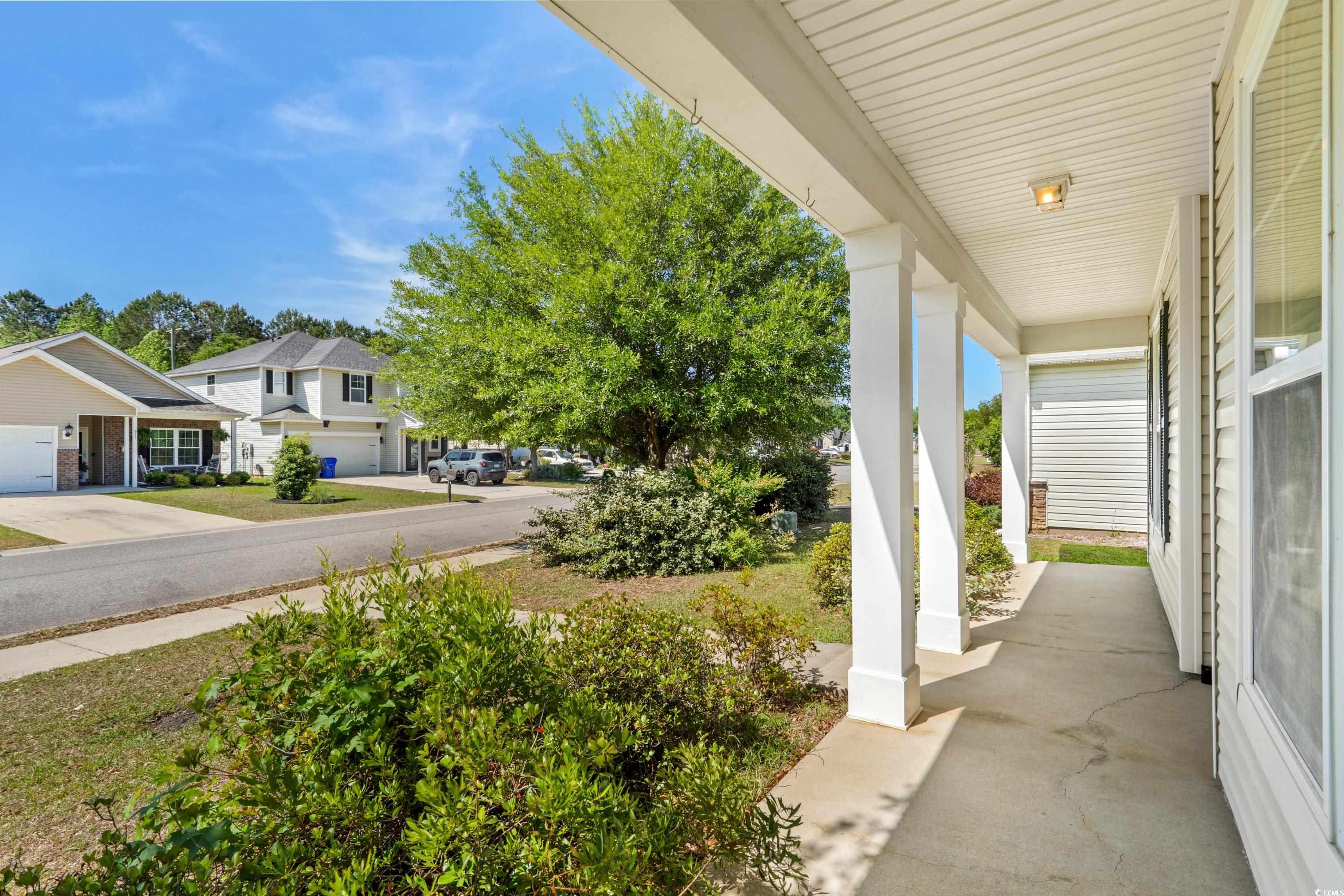 908 Oglethorpe Drive Conway, SC 29527 - Photo 2 of 40 View of patio with covered porch and a residential
