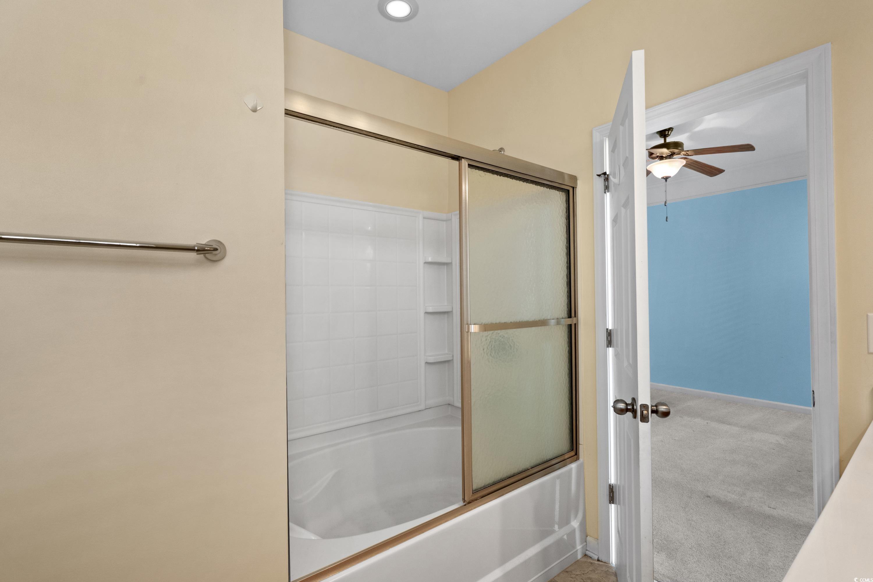 908 Oglethorpe Drive Conway, SC 29527 - Photo 21 of 40 Bathroom with baseboards, a ceiling fan, and showe
