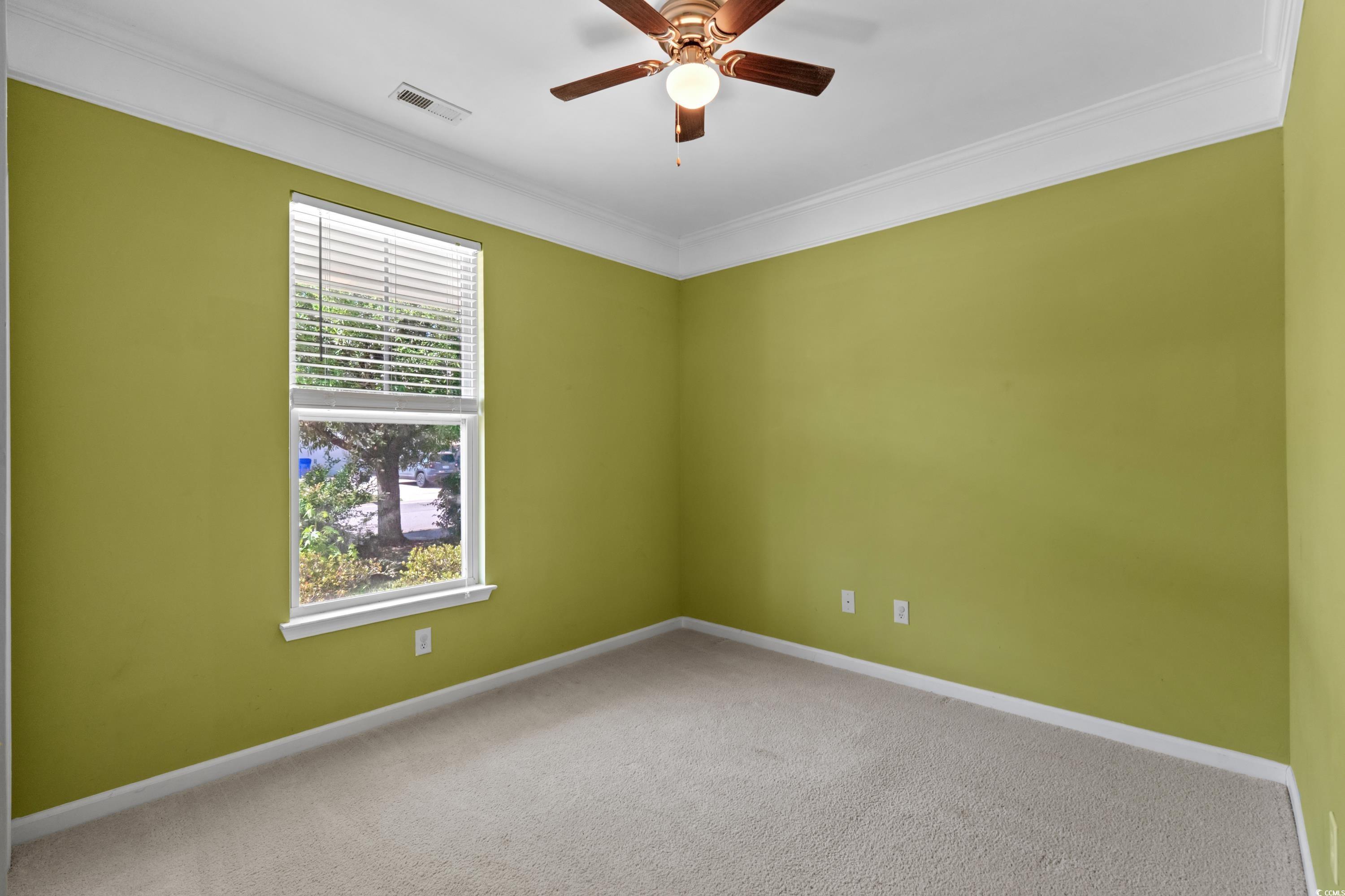 908 Oglethorpe Drive Conway, SC 29527 - Photo 23 of 40 Carpeted empty room with baseboards, ornamental mo