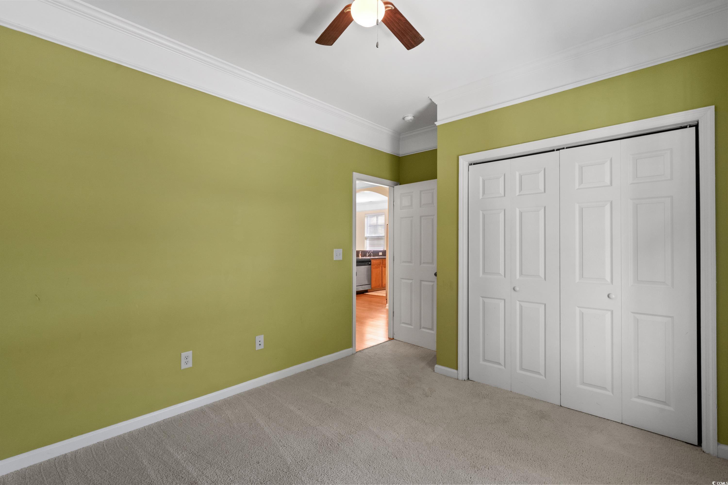 908 Oglethorpe Drive Conway, SC 29527 - Photo 24 of 40 Unfurnished bedroom featuring ceiling fan, crown m