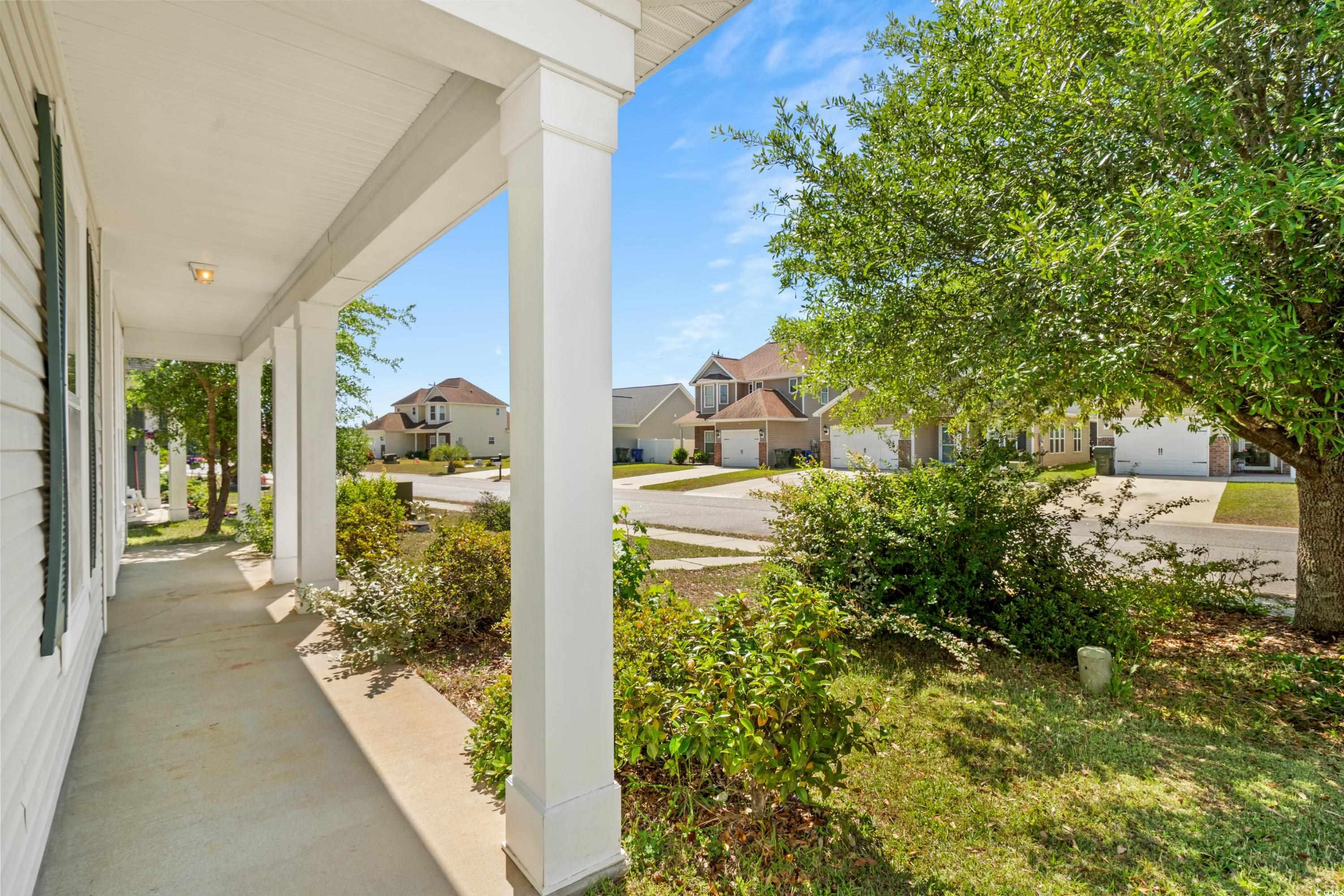 908 Oglethorpe Drive Conway, SC 29527 - Photo 3 of 40 View of patio featuring covered porch and a reside
