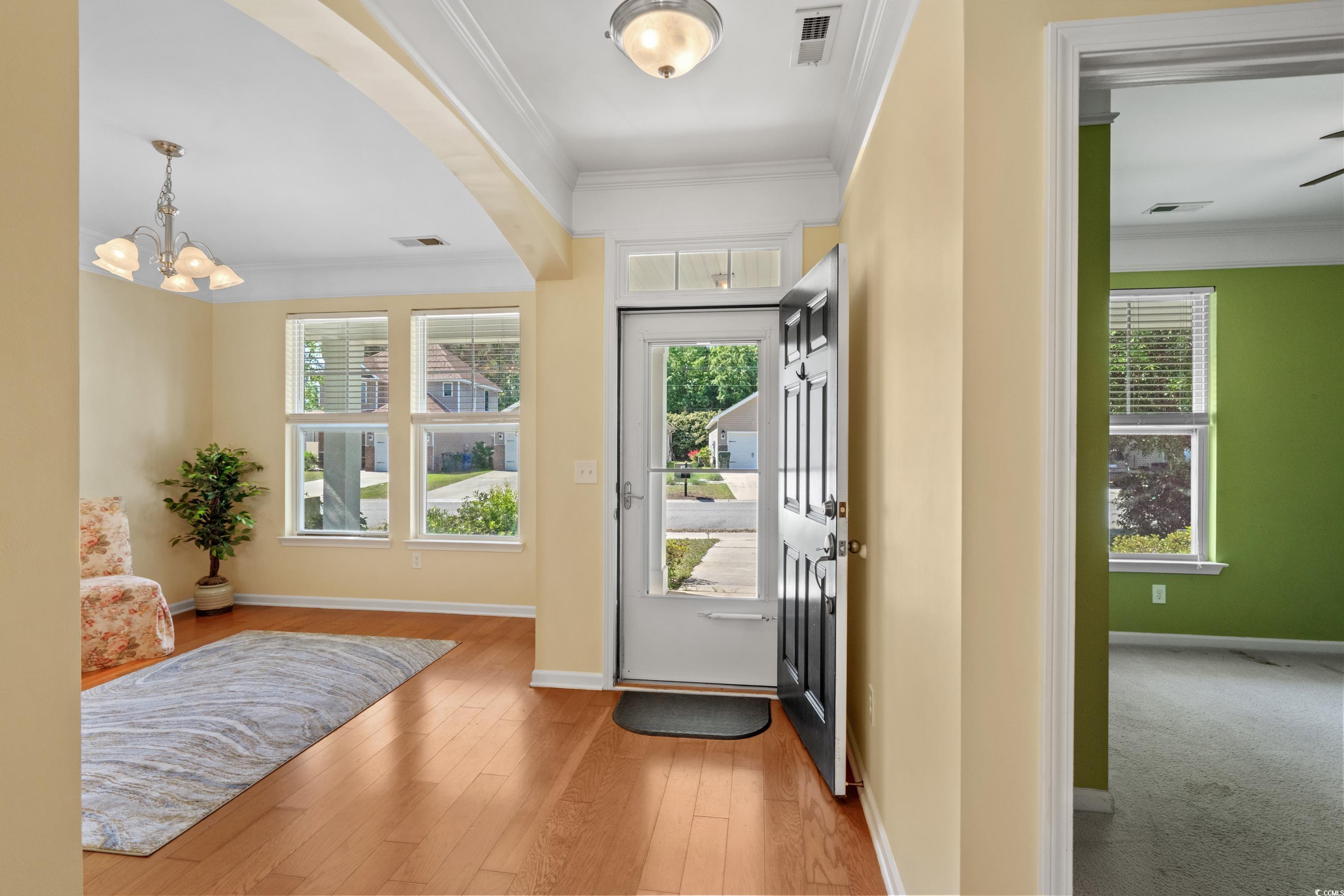 908 Oglethorpe Drive Conway, SC 29527 - Photo 5 of 40 Entryway with ornamental molding and a wealth of n