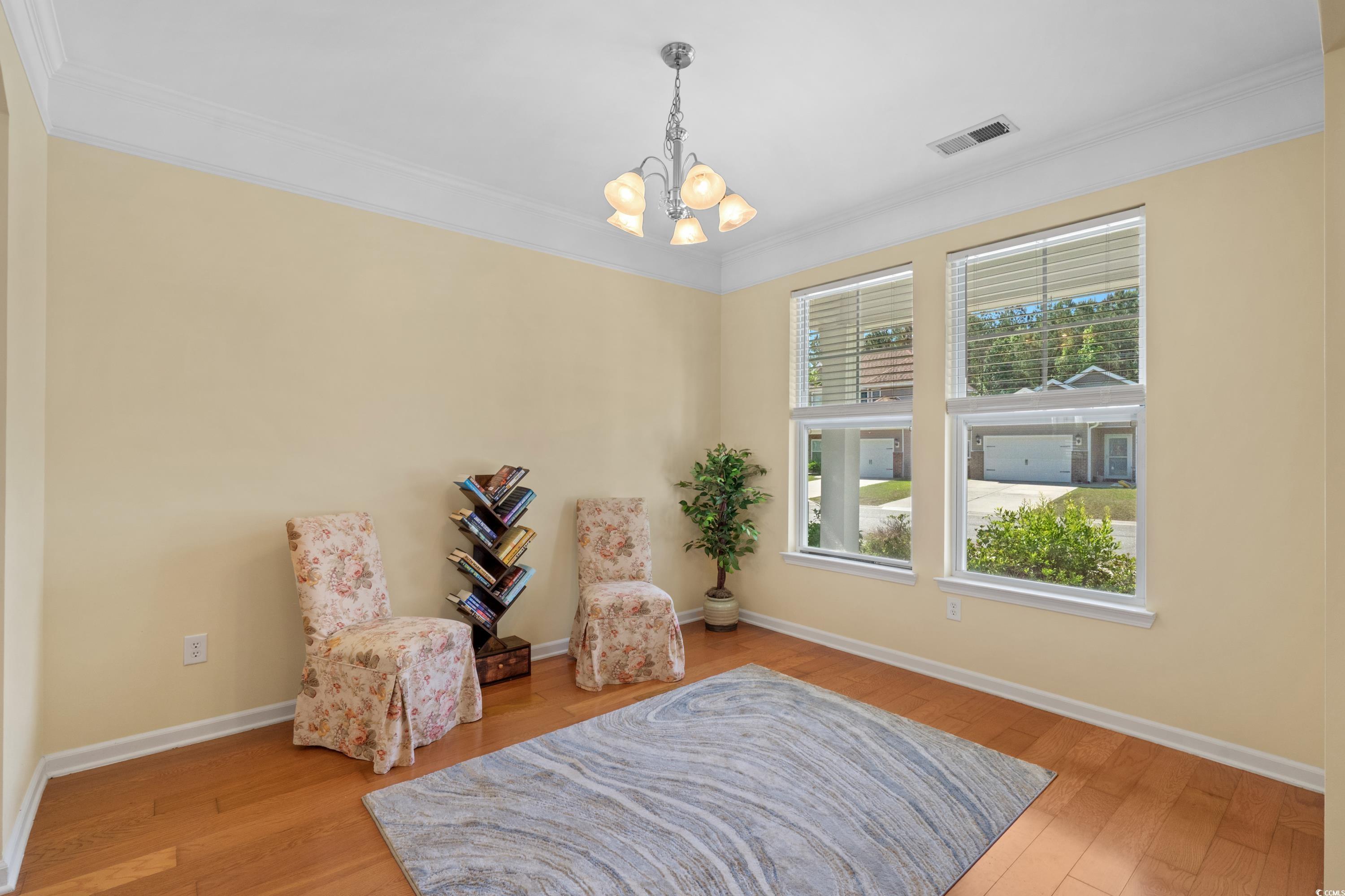 908 Oglethorpe Drive Conway, SC 29527 - Photo 6 of 40 Sitting room with visible vents, crown molding, wo