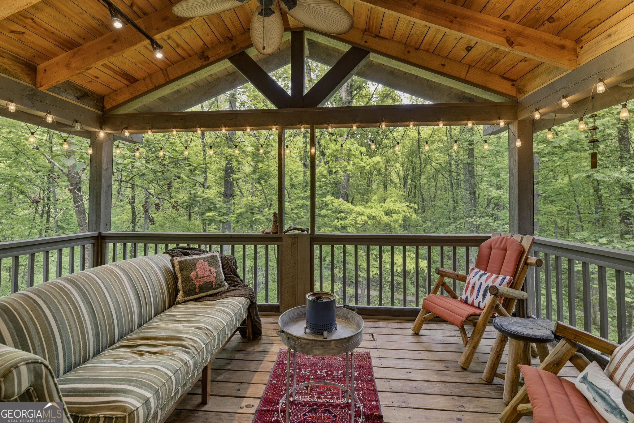634 Little Hawk Road Sautee Nacoochee, GA 30571 - Photo 23 of 54 a balcony with wooden floor stairs and furniture