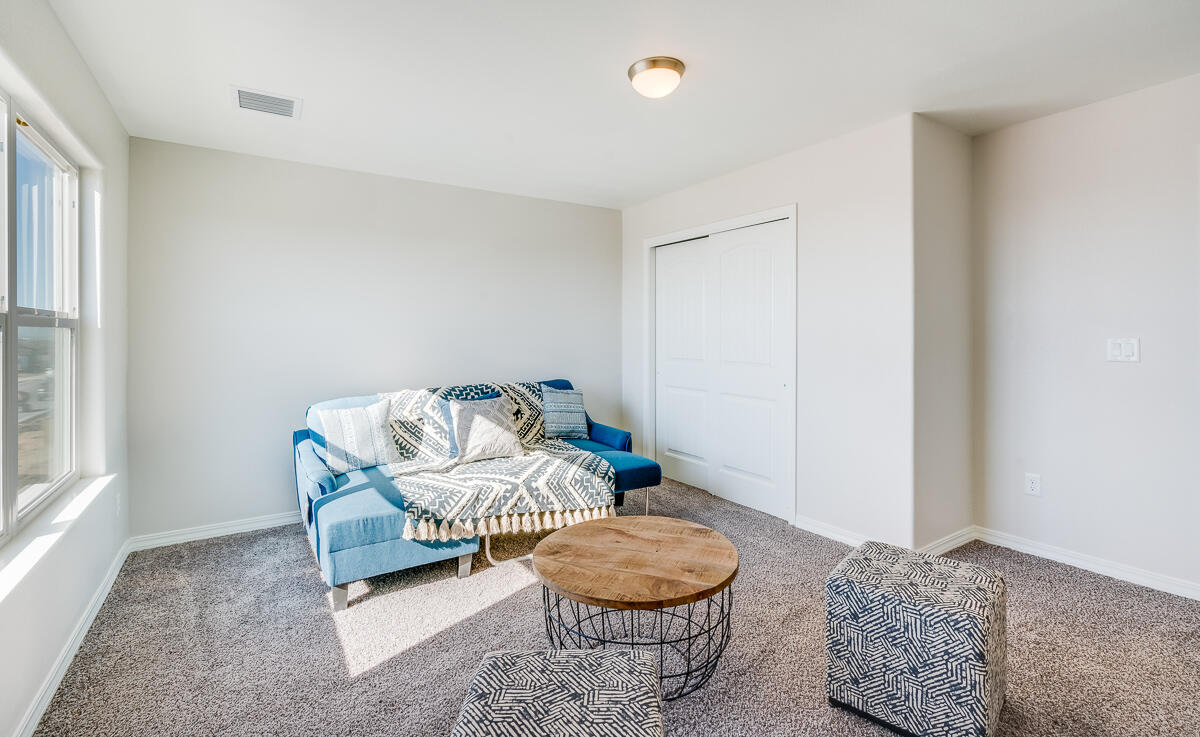 15352 Resolve Avenue El Paso, TX 79938 - Photo 11 of 22 a living room with furniture and a window