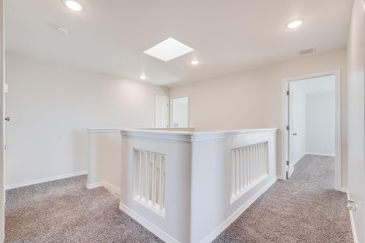 15352 Resolve Avenue El Paso, TX 79938 - Photo 14 of 22 a view of livingroom with washer and dryer