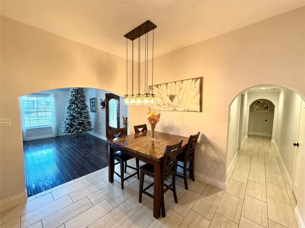 a bedroom with a bed and a chair