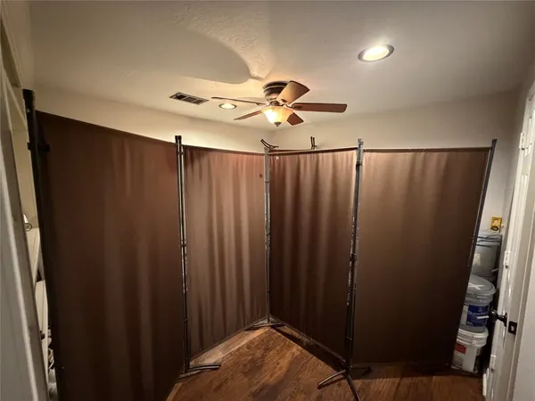 a bathroom with a sink a mirror and a toilet