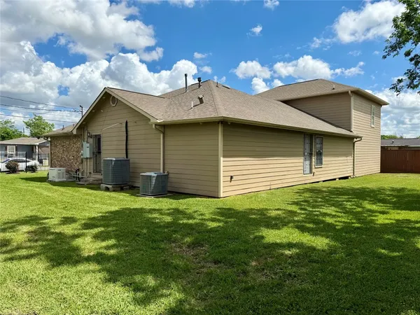a room with water heater and a window