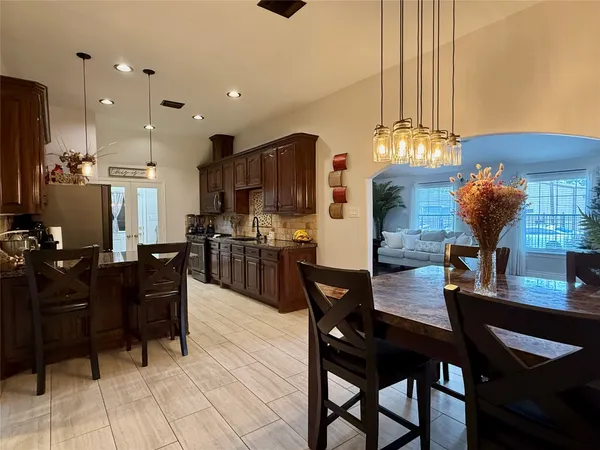 a view of a hallway with bathroom