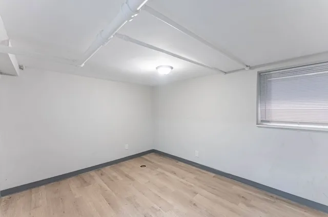 a bedroom with a bed and closet