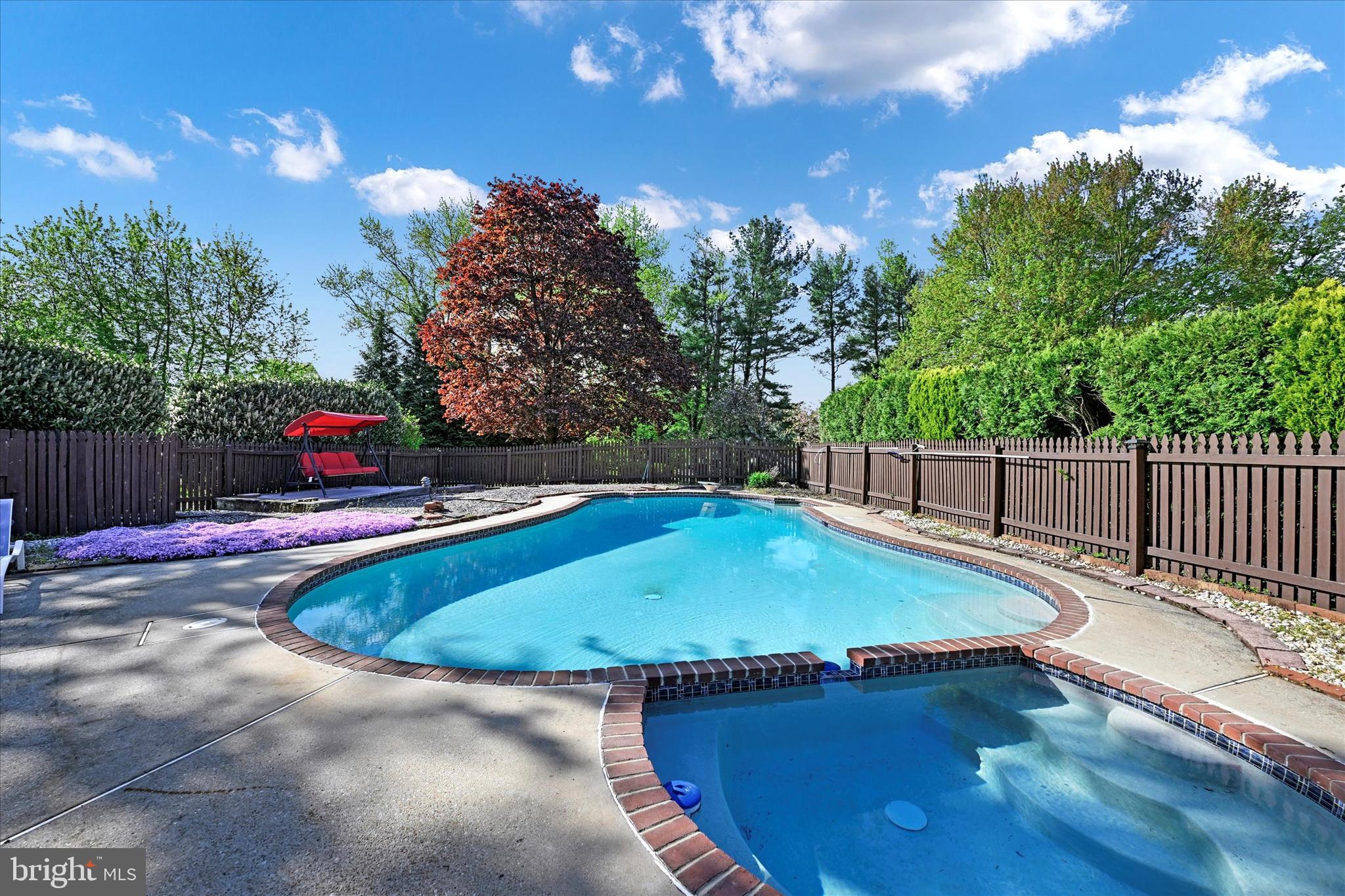 4009 Eland Road Phoenix, MD 21131 - Photo 34 of 38 a small pool with a small yard in front of it