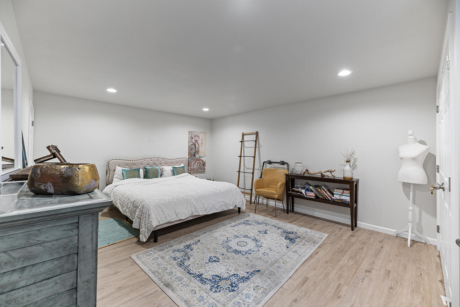 457 Elm Street Phoenix, OR 97535 - Photo 15 of 27 a bedroom with furniture and a wooden floor