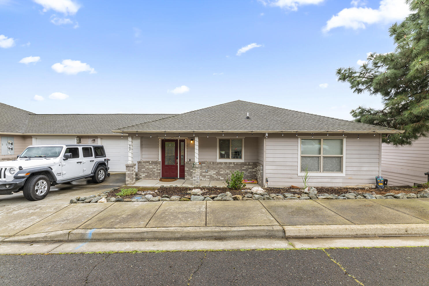 457 Elm Street Phoenix, OR 97535 - Photo 26 of 27 a view of a house with a patio