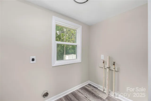 a view of a room that has a window in it