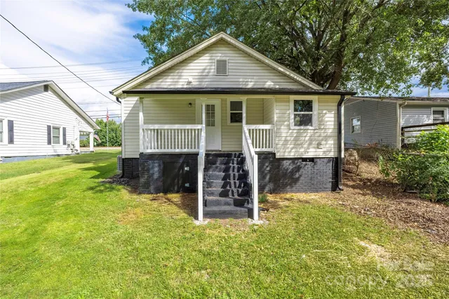 front view of house with a yard