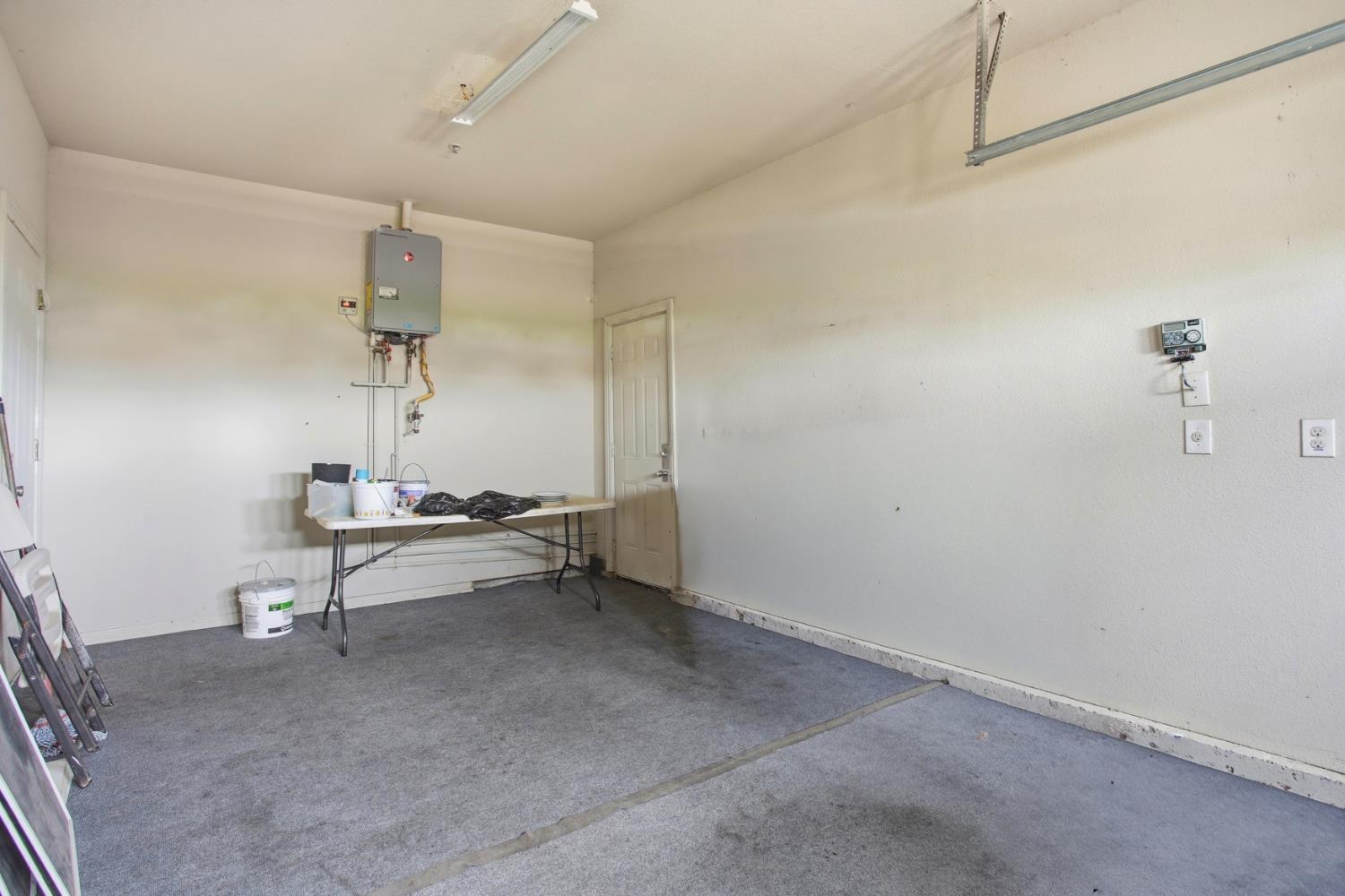 5680 Power Inn Road Sacramento, CA 95824 - Photo 32 of 48 a view of a room with table and chairs