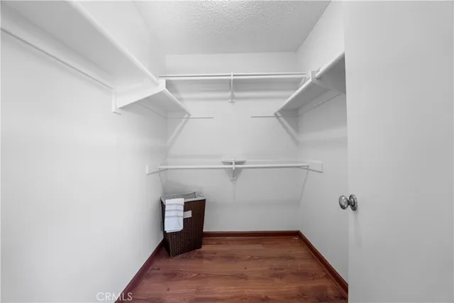 a view of a room with racks on the wall