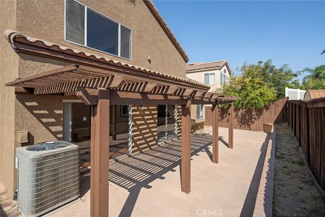 a front view of a house with stairs