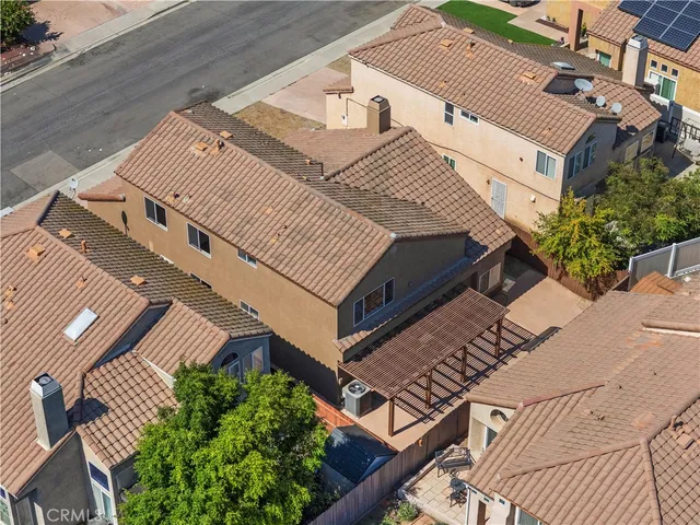 a view of a house with a street
