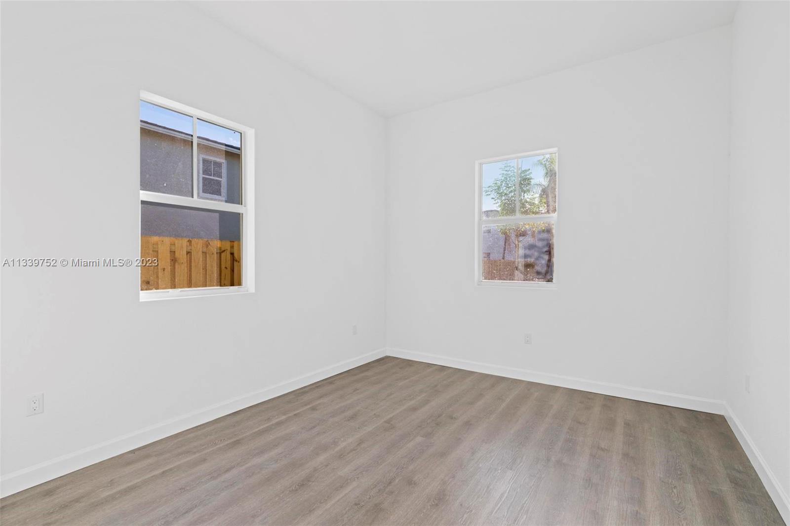 24721 Southwest 112th Court Homestead, FL 33032 - Photo 19 of 40 an empty room with a window