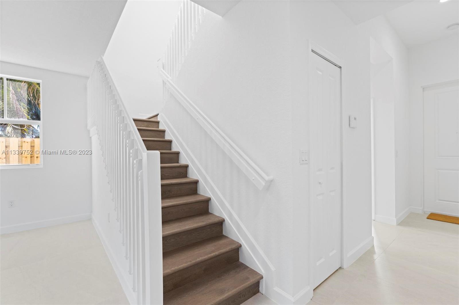 24721 Southwest 112th Court Homestead, FL 33032 - Photo 20 of 40 a view of entryway with wooden floor