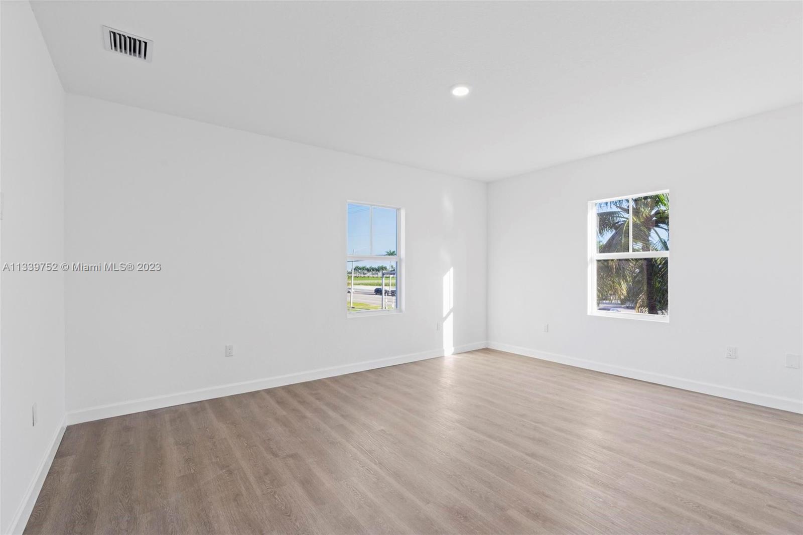 24721 Southwest 112th Court Homestead, FL 33032 - Photo 21 of 40 an empty room with a window