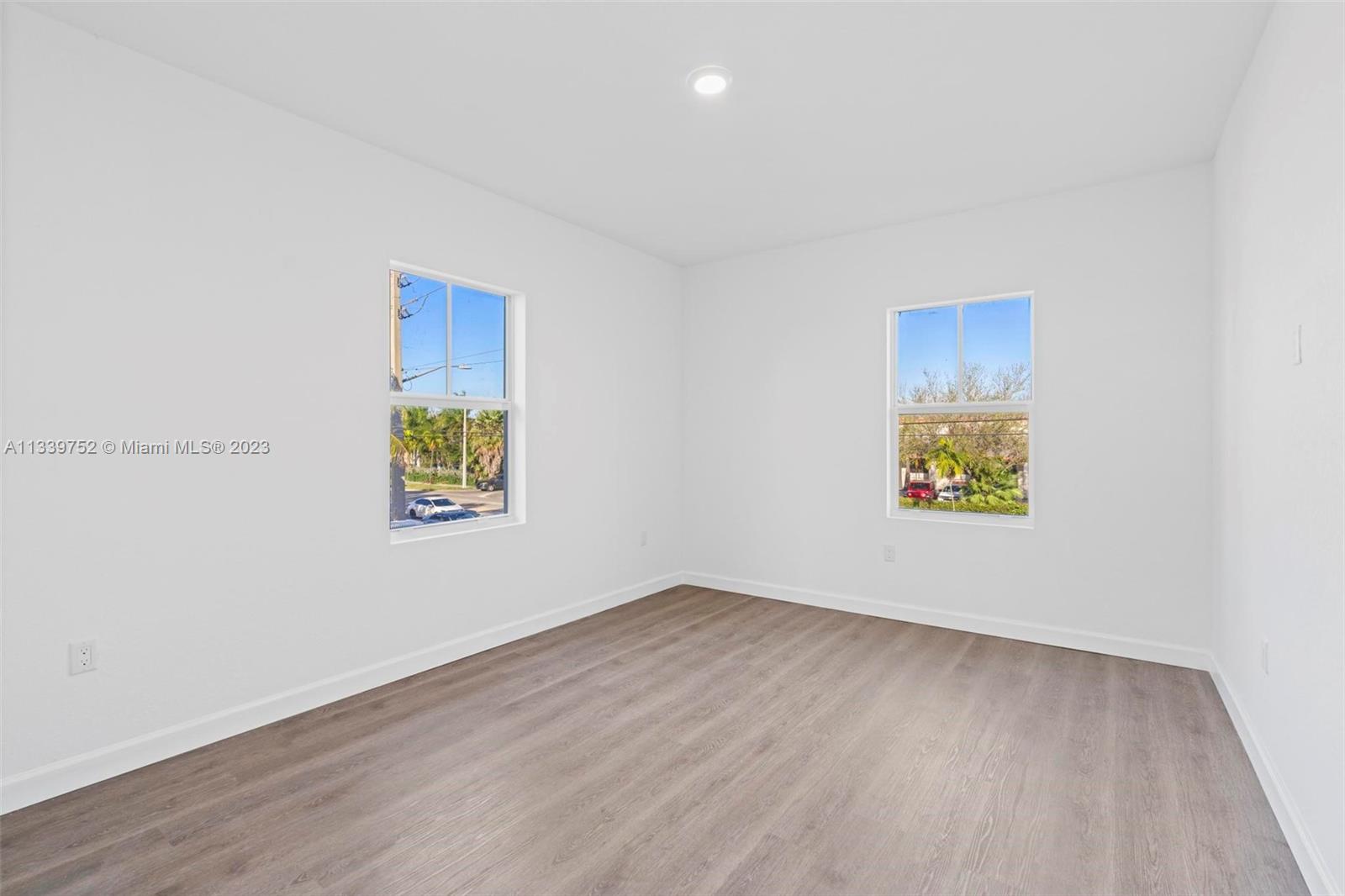 24721 Southwest 112th Court Homestead, FL 33032 - Photo 26 of 40 an empty room with a window
