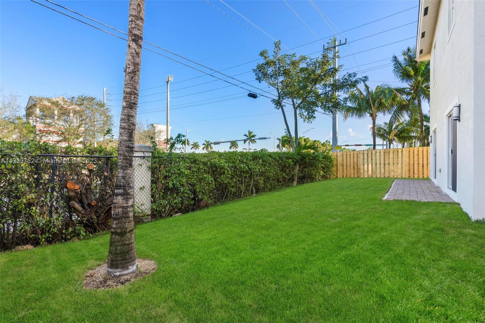 24721 Southwest 112th Court Homestead, FL 33032 - Photo 31 of 40 a view of a garden with a tree