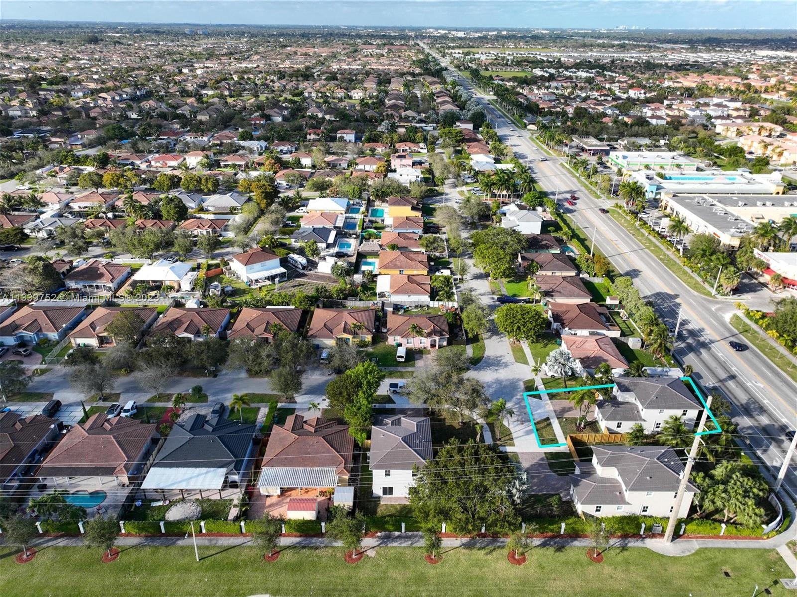 24721 Southwest 112th Court Homestead, FL 33032 - Photo 40 of 40 an aerial view of residential houses with outdoor space and parking